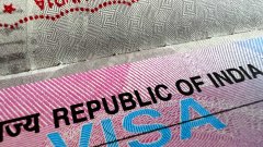 <b>India suspends visa services for Canadians, demands parity in diplomats</b>