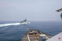 The United States announced a video of US -China warships, saying that the two armed f