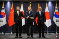 China, Japan and South Korea agreed to fight for the three -nation summit meeting this