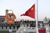 More than 300,000 people gathered in Tiananmen Square to watch the eleven -littering c