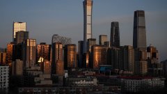 <b>China holds back on more stimulus, citing necessary 'pain'</b>