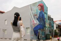 Cai Jialiang: Talk about cultural and artistic standards from red head scarf murals